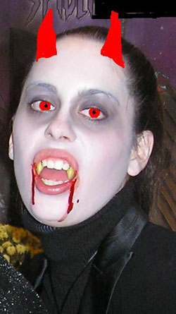 Halloween costume Vampire with horns and blood