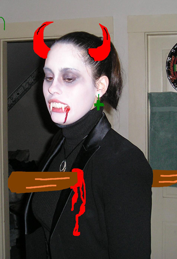 Halloween costume, vampire with red horns and blood